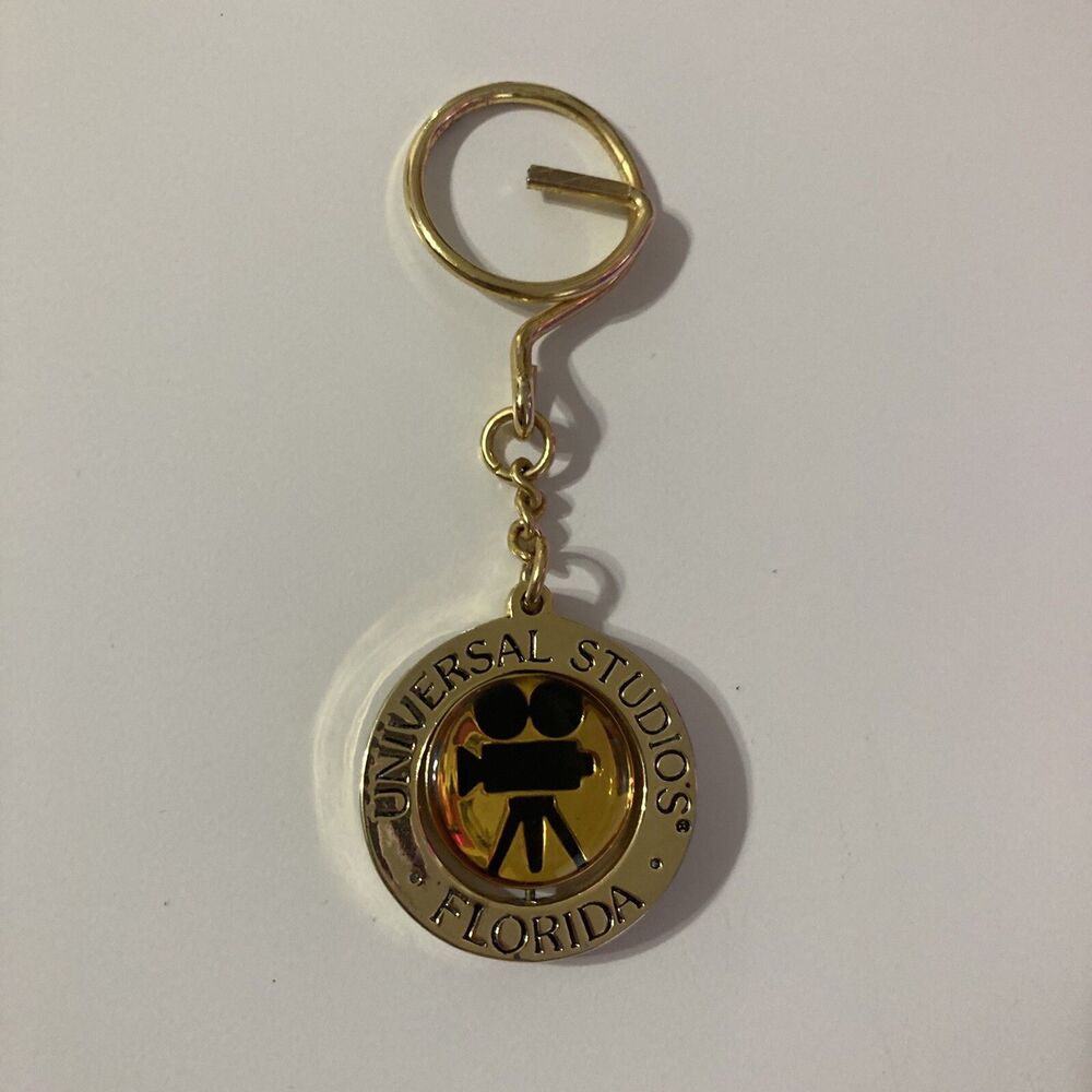 Universal Studios Florida Spinning Keychain Gold Tone Filming Reel Vintage 90s